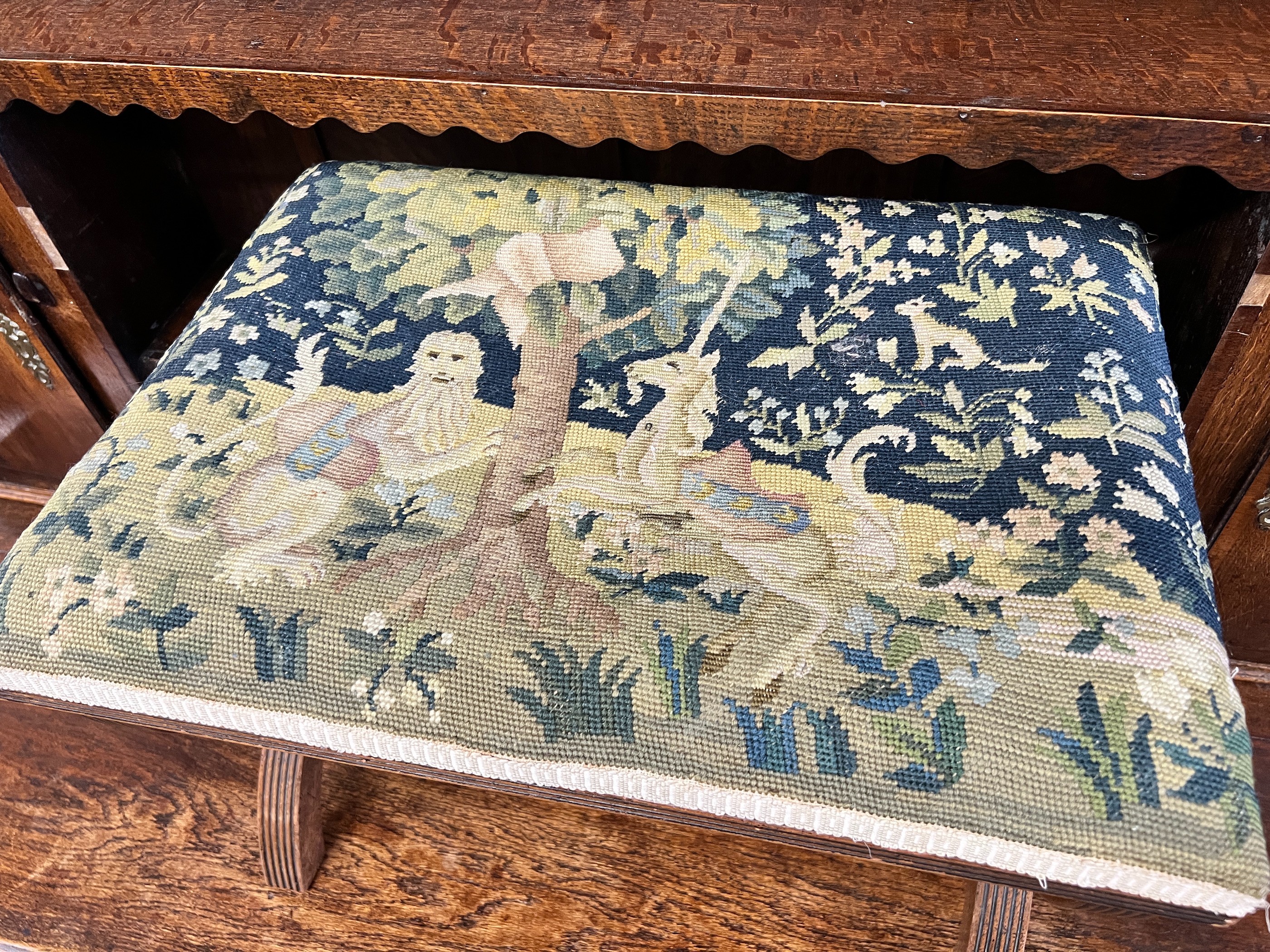 A Regency style mahogany X framed stool, upholstered with a fragment of 17th century Aubusson tapestry, height 40cm